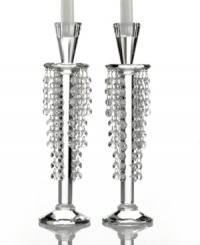 Candlestick meets chandelier in glamorous Barcelona candle holders from Lighting by Design. Glistening beads dangle between the light above and faceted base below for a pair with old-world grandeur.