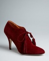 Bettye Muller combines stylish pointed toes and oxford details in these must-have high heels.