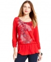 Style&co. makes this printed petite top vibrant with bold color, studded detail and a fun drop-waist silhouette.