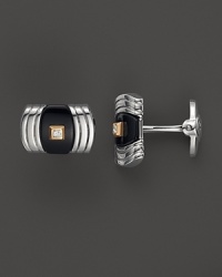 Striking onyx, a glittering diamond and bright 14K. gold enhance the gleam of sterling silver. By Dolan & Bullock. From the Stone Accent Collection.