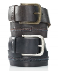 Add a hefty dose of rugged vintage style to your favorite jeans combo with the sleek center stitching and antiqued metal buckle of this leather harness belt from GUESS. (Clearance)