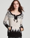 Put your hands together and go boho-chic for this cozy Free People sweater rendered in a soft wool blend.