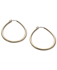 A classic hoop earring in a teardrop design from Fossil. Crafted in shiny gold tone stainless steel. Approximate diameter: 2-1/3 inches.