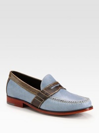 A traditional loafer style is redefined by colorful contrasts, in finely textured leather.Leather upperLeather liningPadded insoleLeather soleImported