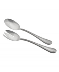 Echoing the elegant details of a wedding dress, these Grosgrain salad servers from Vera Wang marry clean lines in lavish silver plate with ribbon-inspired trim.