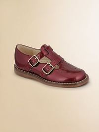 A chic T-strap design in metallic, finished with a double buckle closure and perforated teardrops on the toe for a precious look. Double buckle closure Synthetic upper Rubber sole Padded insole Leather lining ImportedPlease note: It is recommended that you order a ½ size smaller than measured. If your child measures a size 7.0, you may want to order a 6½. 