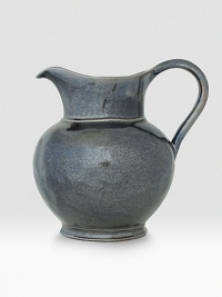 A unique mottling technique lends a hand-thumbed, hammered design to a beautiful metallic pewter pitcher with the look of an old-world favorite. 2.2-quart capacity 8 high Dishwasher safe Imported