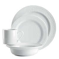 Vivid white porcelain embossed with a subtle crosshatch pattern gives this dinnerware assortment from Dansk versatile warmth, and just a hint of texture.