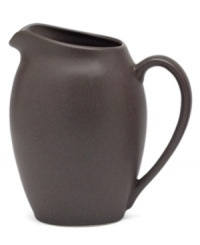 Crafted from versatile stoneware, this creamer is perfect for casual dining and elegant entertaining. The deep chocolate brown color enriches any tabletop while the classic shape makes this creamer a practical choice.