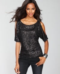 Sparkling sequins provide a festive look to INC's top, which also features alluring shoulder cutouts!