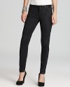 Rocker chic becomes you in these skinny, black washed James jeans, rendered in smooth faux leather.