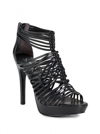 THE LOOKOpen toeStrappy, woven cage styleBack zipTHE FITSelf-covered heel, 4¼ (110mm)Self-covered platform, ¾ (20mm)Compares to a 3½ heel (90mm)THE MATERIALLeather lining and sole Padded insoleORIGINImportedOUR FIT MODEL RECOMMENDS ordering one half size up as this style runs small. 