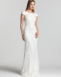 Tadashi Shoji's elegant lace gown is bedecked in sparkling beads for a touch of glamour.