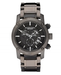 This Burberry timepiece features a gray ion-plated stainless steel bracelet and round case. Black chronograph dial features silver tone stick indices, date window at four o'clock, three subdials and logo. Quartz movement. Water resistant to 100 meters. Two-year limited warranty.