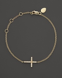 A diamond-studded cross adds elegance to this slender, adjustable 14K. yellow gold bracelet from Meira T.