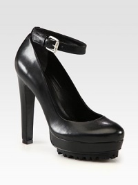 Ultra-high heel and platform carry this smooth leather pump with a rubber sole and an adjustable ankle strap. Self-covered heel, 5 (125mm)Island platform, 1½ (40mm)Compares to a 3½ heel (90mm)Leather upperLeather liningRubber solePadded insoleImported