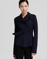 An office classic gets a new-season upgrade with this Donna Karan New York belted jacket flaunting storm flaps and seam detail throughout the silhouette. The perfect piece to elevate minimalist separates, it moves through your schedule with refined sophistication.