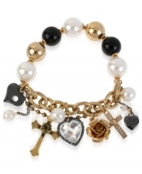 Shine of the cross. This multi-charm half stretch bracelet from Betsey Johnson is crafted from gold-tone mixed metal and glass pearls, and features cross and heart charms for a stylish touch. Item comes packaged in a signature Betsey Johnson Gift Box. Approximate length: 7-1/2 inches.