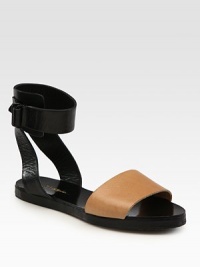 Rich leather style with a contrasting, adjustable ankle strap. Leather upperLeather lining and soleImported