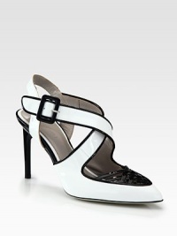 Dramatic two-tone silhouette in mirrored patent leather with interlacing crisscrossed straps. Lacquered heel, 3½ (90mm)Patent leather upperPoint toeAdjustable ankle strapLeather lining and solePadded insoleMade in Italy