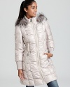 Plush fox fur trim elevates this Elie Tahari jacket, featuring quilting and ruching, from staple to sublime.