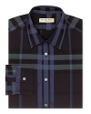 A broad check pattern blending tonal hues distinguishes this handsome dress shirt from Burberry.