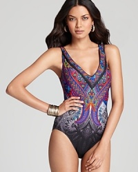 Weave an epic tale on your next oceanic adventure in this retro, paisley Gottex swimsuit. In beautiful, rich jewel tones, it is a perfect way to incorporate the season's color story.