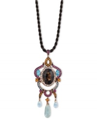 Illuminate your look with a spectrum of color. Le Vian's intricate chandelier pendant combines oval-cut smokey quartz (6-3/4 ct. t.w.), oval and round-cut blue topaz (1-1/4 ct. t.w.), round-cut rhodolite (3/4 ct. t.w.), round-cut citrine (1/2 ct. t.w.), round-cut green amethyst (3-1/5 ct. t.w.), round-cut white topaz (3/8 ct. t.w.) and marquise-cut garnet (3 ct. t.w.). Set in 14k rose gold and strung from a brown silk cord. Approximate length: 18 inches. Approximate drop: 2-3/4 inches.