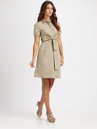 A crisp poplin shirtdress with sleek appeal, courtesy of a hidden button front and pretty Princess seams. Collar neckShort sleevesConcealed button frontSlash pocketsAbout 38 from shoulder to hem67% cotton/28% polyester/5% elastaneDry cleanImported Model shown is 5'9½ (176cm) wearing US size 4. OUR FIT MODEL RECOMMENDS ordering true size. 