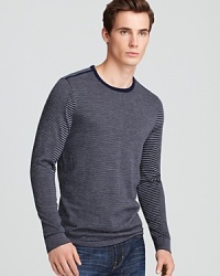 Crafted in soft merino wool for indulgent comfort, this uniquely striped sweater features contrast panels at the shoulder and under the arm, plus trim detail, for an exciting design you'll reach for again and again.