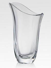 Smooth, fluid lines wrap around this stunning vase of fine crystal. 12 highHand washImported