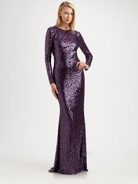 Shimmering allover sequins add a festive air to this artfully draped, floor-length style.Jewel necklineLong sleevesAllover sequinsCowl backFully linedAbout 47 from natural waistNylonDry cleanImportedModel shown is 5'11 (180cm) wearing US size 4. 