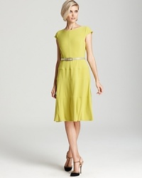 A swing skirt lends a ladylike look to this belted, figure-flattering Anne Klein dress.