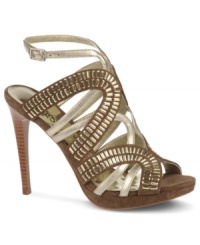 Metallic overload! Carlos by Carlos Santana's Tzarina platform dress sandals feature shiny crisscrossing arcs that add shimmer and decorated detail to your dressiest looks.