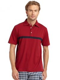 THE LOOKPolo collarFront button placketShort sleevesContrast stripe accentVented shirttail hemTHE MATERIALCottonCARE & ORIGINMachine washImportedThis item was originally available for purchase at Saks Fifth Avenue OFF 5TH stores. 