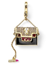 This handbag charm by Juicy Couture brings it-bag bling to your bracelet.