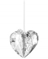 Silvertone metal pierced with intricate patterns and sparkling chatons adds even more splendor to this exquisite Swarovski crystal heart ornament.