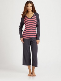 Spend your down time in silky-soft stretch jersey, enlivened with fresh-toned stripes.Banded V-necklineLong solid raglan sleevesElastic waist pantsInseam, about 25Rayon/spandexMachine washImported