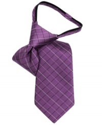 Etched in silk. This grid tie from Calvin Klein will give his buttoned-up look a classic finish with a simple zip closure.