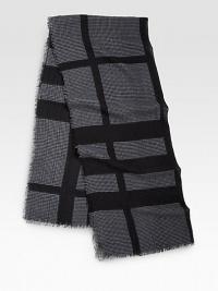 A warm wool style in a iconic check pattern accented in classic houndstooth. WoolAbout 27½ X 59Dry cleanMade in Italy