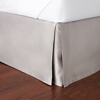 The dobby stripes in shades of taupe and vanilla bordered by raised satin on this Hudson Park king bedskirt evoke modern simplicity and timeless sophistication.