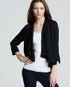 Cut in an elegantly draped silhouette, this BCBGeneration jacket is super-chic layered over tees and party frocks alike.