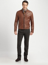 Ribbed knit banding, uniquely placed at the collar, shoulder and hem enhance the blousy effect of this jacket rendered in luxuriously soft lambskin leather.Two-way zip frontStand collarSide slash pocketsRibbed knit collar, shoulder and hem detailFully linedAbout 26 from shoulder to hemLeatherDry cleanImported