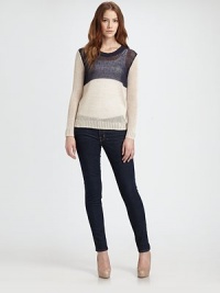 Chunky, semi-sheer knit in a relaxed silhouette with ribbed trim and a modern colorblock design. Ribbed, semi-sheer crewneckDropped shouldersLong sleevesRibbed cuffs and hemSemi-sheer upper backLinen/spandexDry cleanImported of Italian fabricModel shown is 5'10 (177cm) wearing US size Small.