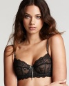 This underwire bra looks beautiful with corsetry influences such as intricate seaming and lace details. Style #E75-261