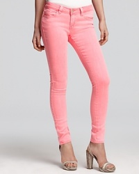 Punch up your denim line-up with these eye-popping GUESS skinny jeans.