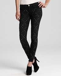 Edgy studs lend rock-inspired style to these skinny Current/Elliott jeans.