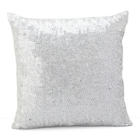 A luxe, decorative pillow covered in shimmering, translucent sequins.