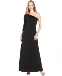 Glamour is effortless in this one-shoulder Calvin Klein gown, crowned with a band of sequins at the neckline.