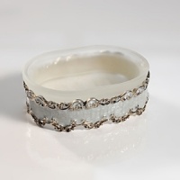 Elaborate, elegant bath accessories for the traditional home, hand-enameled with antique silver accents.